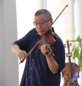 a pic of Calvin Lee with violin IMG_6900