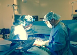 two surgeons working at the same time - Crop